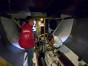 Skipper Chris Nicholson checks the progress of repairs made to CAMPER with Emirates Team New Zealand in Puerto Montt, Chile, during leg 5 of the Volvo Ocean Race 2011-12, from Auckland, New Zealand to Itajai, Brazil.